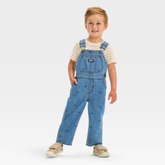 Add classic cool to your toddler’s wardrobe with these OshKosh B’gosh denim overalls. An instant outfit, these classic denim overalls for boys can be paired with any long sleeve shirt to give your handsome little one cool and confident style while he’s playing with his friends or out and about running errands with you! Details like functional pockets, a cute train print and adjustable straps remind you of why they're such a favorite. Pair his cool overalls with his favorite boots to create a war Toddler Overalls Outfit Boys, Overalls Outfit Boys, Toddler Overalls Outfit, Cool Overalls, Boys Overalls, Toddler Overalls, Overalls Outfit, Confident Style, Boys Plaid