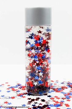 red, white and blue sprinkles in a glass jar