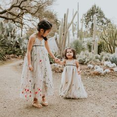 Your little girl will be so giddy when she finds out that she matches momma in Garden Lace for women! Size Chart. True to size; consider sizing up if maxi length is desired. Dress: 100% polyester tulle with cotton embroidery. Lining: 100% cotton voile. Velvet ribbon trim. Hand wash in cold water or machine wash cold on gentle cycle. Lay flat or air dry out of direct sunlight. Handcrafted beautifully in San Francisco Dress Bodice, Garden Dress, Garden Fairy, Most Beautiful Dresses, Wedding Flower Girl, Simple Dress, Dress Order, The Perfect Guy, Cotton Embroidery