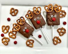 some pretzel sticks with reindeer faces on them