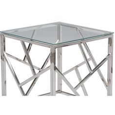 a glass and metal side table with geometric design on the top, against a white background