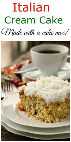 a close up of a piece of cake on a plate with a cup of coffee in the background