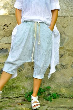 "Linen Pants, Harem Pants, Drop Crotch Pants ◾ Light blue LINEN pants. Loose harem pants. Summer comfortable quality linen pants. Light blue pants of high-quality linen. Elastic westband. Two pockets. The pants are very comfy. They have a sporty elegant style. Loose fitting. ◾ The clothes are truly boutique! ◾ I'm Glad that you came into my boutique :) ✂ Fabric: 100% lINEN Color:Light Blue ◾ The style was originally designed and professionally constructed by me. Each item of my shop is specially Spring Short Pants With Hip Pockets, Straight Pants With Hip Pockets For Summer, Summer Straight Pants With Hip Pockets, Summer Tapered Leg Bottoms With Pockets, Relaxed Fit Harem Pants With Hip Pockets For Summer, Summer Wide Leg Harem Pants With Hip Pockets, Baggy Blue Linen Bottoms, Baggy Blue Linen Pants, Green Short Pants With Hip Pockets