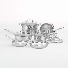 a bunch of pots and pans that are all in one place on the table