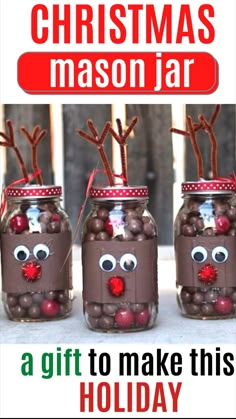 three mason jars decorated with reindeer noses and candy balls, the words christmas mason jar a gift to make this holiday