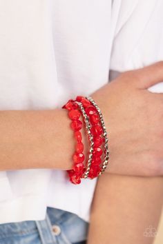 Pacific Picnic Red Necklace - Paparazzi Accessories Threaded along invisible wires, rows of faceted silver beads give way to opaque Poinciana gem-like beads below the collar for a summery splash of color. Features an adjustable clasp closure. Sold as one individual necklace. Includes one pair of matching earrings. Seaside Siesta Red Bracelet - Paparazzi Accessories Strands of faceted silver beads and opaque Poinciana gem-like beads are threaded along stretchy bands around the wrist, layering in Red Faceted Beads Bracelet, Traditional Red Faceted Beads Bracelet, Red Beaded Jewelry For Summer, Summer Party Jewelry With Faceted Beads, Summer Red Beaded Jewelry, Red Summer Party Jewelry, Red Beaded Bracelets With Spacer Beads For Party, Multi-strand Summer Jewelry For Party, Adjustable Multi-strand Party Beads