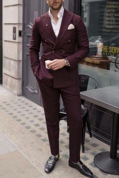 Man wearing a burgundy suit. Maroon Wedding Suits Men, Dark Maroon Suit Men, Burgundy Suit For Men, Wine Red Suit Men Wedding, Suits Men Maroon, Maroon Double Breasted Suit, Maroon Coat Outfit Men, Burgundy Double Breasted Suit Men, Maroon Suit Men Wedding