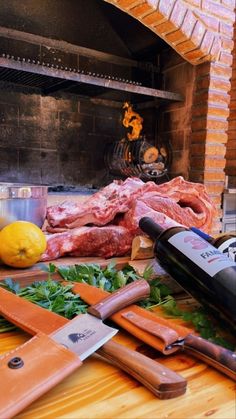 a bunch of food that is laying out on a table next to a fire place