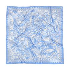 Introducing our Sky Blue Palms Silk Scarf, a must-have accessory for women seeking a touch of tropical style. Crafted from luxurious 100% mulberry silk, this bandana features a vibrant palm leaves print that captures the essence of a sunny paradise. The twill weave provides a soft and smooth texture, enhancing the scarf's elegance and durability. With a versatile size of 90x90cm, this scarf can be styled in numerous ways: as a head scarf, neckerchief, shawl, or even a chic bralette top. It's per Silk Scarf Pattern, Bandana Neck Scarf, Twill Pattern, Blue Silk Scarf, Wavy Pattern, Head Scarf Styles, Scarf Bandana, How To Wear A Scarf, Palm Leaves Print