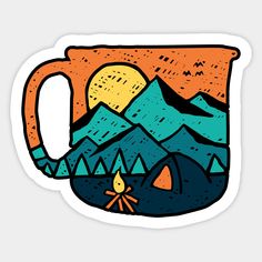 a coffee mug with mountains in the background and a campfire on the ground next to it