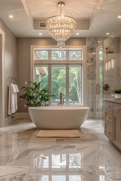 Luxury Awaits: Tour This Elegant Bathroom with Marble Floors & Crystal Chandelier Bathroom Flooring Ideas Neutral, Standalone Bathtub, Bathroom With Marble, Upscale Bathroom, Bathroom Flooring Ideas, Luxury On A Budget, Luxury Bathroom Tiles, Spacious Bathroom, Marble Floors