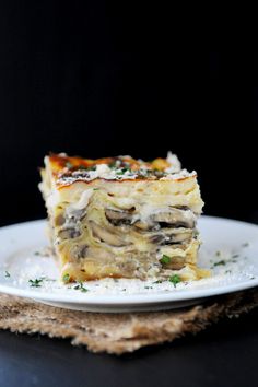 a slice of mushroom lasagna on a plate