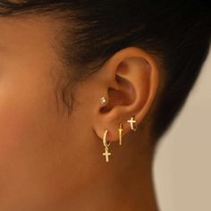 Tiny Cross Huggie earrings that fit snug around your ear. Great for those who have small earlobes. Perfect to wear on your secondary holes or cartilage for those with large earlobes.| Lead and Nickel free. Sold as a PAIR Gold Vermeil (Thick layer of Gold plated over Sterling Silver) Cubic Zirconia Gemstone Width 6mm(0.24in) Inside Diameter 6mm(0.24in), Not for first hole, Hoop Thickness 2mm(0.08in) Hinge closure #E540-G Earring Ideas For Two Holes, Cross Piercing, Amyo Jewelry, Forrest Frank, Knots Jewelry, Thrift Ideas, Earrings Cross, Christmas Haul, Huggie Earrings Gold