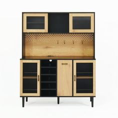 a wooden cabinet with black doors and drawers