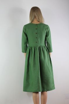 "Spring dress, Handmade greenl color linen dress with 3/4 long sleeves and 2 pockets , perfect for casual wear and suitable for any occasion in any season Details: - 100% natural linen produced in Europe ; - medium weight (180 gram per square meter); - color: green, could be any from our colors catalog (color samples at the photo); Made to order, approximately a few days, If you have any questions please message me and I will be glad to answer. Size guide : Size XS Bust: fits bust around 33\"-34 Elegant Linen Dress With 3/4 Sleeves, Green Linen Dress With Pockets, Green Relaxed Fit Linen Dress, Green Relaxed Fit Linen Dress With Pockets, Green Linen Dress With Pockets For Spring, Spring Green Linen Dress With Pockets, Green Linen Knee-length Midi Dress, Spring Linen Dress With Half Sleeves, Linen Half Sleeve Dress With Relaxed Fit