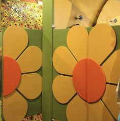 two large flower shaped doors are on display