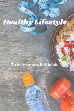 a plate with rice, nuts and fruit on it next to a bottle of water