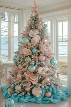 29 Blue Christmas Tree Ideas: Bringing Winter Magic Into Your Home - ReenaSidhu Mermaid Christmas Tree, Beach Christmas Trees, Whimsical Christmas Decor, Coastal Christmas Tree, Mermaid Christmas, Beachy Christmas