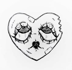 a black and white drawing of a heart with eyes