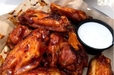 chicken wings with sauce on the side