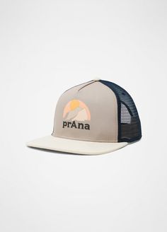 the prana trucker hat is shown in grey and black with an orange sun on it