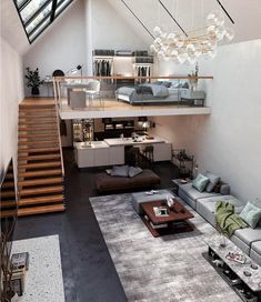 a living room filled with lots of furniture and a staircase leading up to the top floor