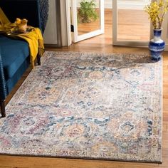 a large area rug in a living room