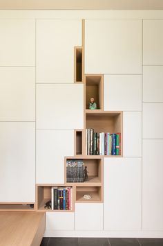 a bookshelf with several shelves filled with books