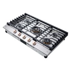 a gas stove with four burners on it