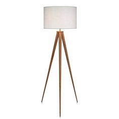 a wooden tripod floor lamp with a white shade