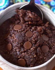 a bowl filled with brownie and chocolate chips