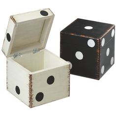 two wooden boxes with black and white polka dots