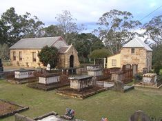 an old cemetery with lots of graves in the yard