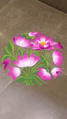 pink flowers painted on the ground with green leaves