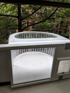 a microwave oven sitting on top of a table