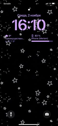 an iphone screen with stars on it and the time displayed in purple, black and white