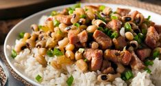 a white plate topped with rice and beans