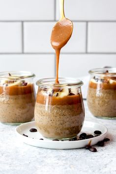 caramel macchiato chia seed pudding in glass jars with spoon