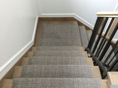 an image of stairs with carpet on them