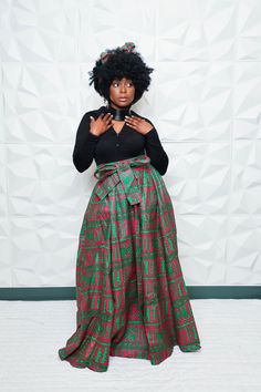 "DESCRIPTION Every day is a good skirt and head wrap day. Our Gorgeous African print Ankara maxi skirt is perfect for any season. Our classy floor length skirt has deep pockets which are perfect to carry your keys, phone, lip gloss, cards, and more. Colors include pink and green. This skirt is 40\" to 42\" long. The skirt also comes with a Matching Head Wrap that measures 5 1/2\" wide and 50\" long. 🔥100% COTTON 🔥ELASTIC WAIST  🔥HAS POCKETS 🔥LONG MAXI LENGTH.  🔥MATCHING HEAD SCARF INCLUDED Long Skirt With Sashes, Ankara Maxi Skirt, African Skirt And Head Wrap, Ankara Two Piece Outfit Skirt Maxi, Ankara Wrap Skirt, Maxi Skirt Ankara High Waist, African Print Maxi Skirt And Crop Top, Dashiki Skirt, Ankara Dress Designs