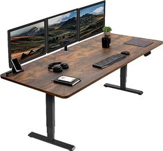 a computer desk with two monitors, keyboard and mouse on top of it in front of a white background