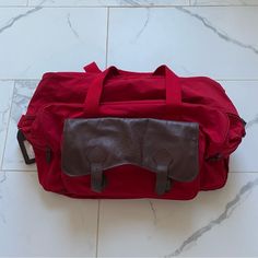 Original 90s Marlboro Bag Good Condition, Few Small Flaws Shown Has Original Luggage Tag Unused Retro Red Shoulder Bag For Everyday, Casual Red Bags For Weekend, Casual Red Bags For The Weekend, Casual Red Bag For Weekend, Casual Red Weekend Bag, Retro Burgundy Travel Bag, Vintage Red Shoulder Bag For Travel, Retro Red Travel Bags, Red Rectangular Weekend Bag