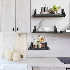 the kitchen is clean and ready to be used for cooking or baking, as well as other items