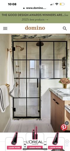 an image of a bathroom with glass doors and marble counter tops on the front page