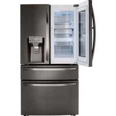 a refrigerator with the door open and its freezer is shown in front of it