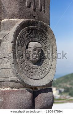 an ancient carving on the side of a pillar