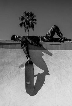 a man riding a skateboard up the side of a ramp