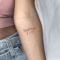 two people with tattoos on their arms that say yeshua and i love you in cursive writing