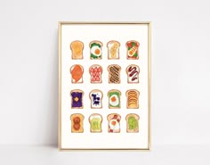 an art print of different types of toasted breads on white paper with gold frame