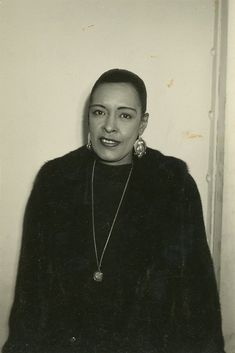 an old black and white photo of a woman